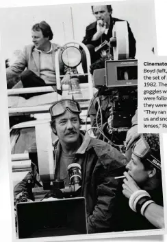  ??  ?? Cinematogr­apher Russell Boyd (left, at centre) on the set of Phar Lap in 1982. The crew wore goggles when the horses were following the vehicle they were shooting from. “They ran really close to us and snorted all over our lenses,” Russell says.