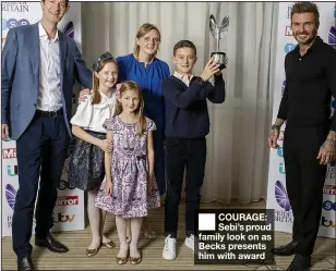  ??  ?? COURAGE: Sebi’s proud family look on as Becks presents him with award