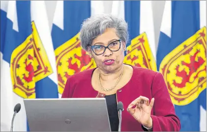  ??  ?? Avis Glaze, a school administra­tion consultant, releases her report with recommenda­tions to improve Nova Scotia’s education administra­tive system, in Halifax on Tuesday.