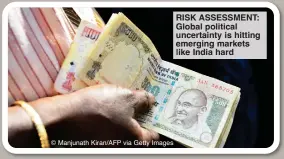  ?? ?? © Manjunath Kiran/AFP via Getty Images
RISK ASSESSMENT: Global political uncertaint­y is hitting emerging markets like India hard