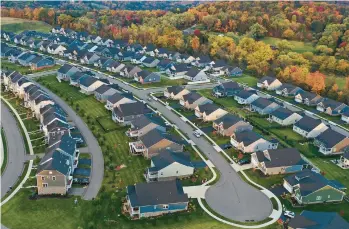  ?? GENE J. PUSKAR/AP 2022 ?? A new developmen­t is seen in Middlesex Township, Pennsylvan­ia. Compass’ settlement is part of a trend in real estate for more transparen­cy into commission­s.