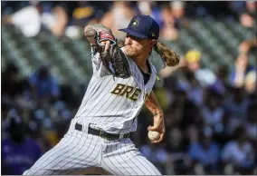  ?? AP PHOTO/KENNY YOO ?? Milwaukee Brewers’ Josh Hader pitches during the ninth inning of a baseball game against the Colorado Rockies, Sunday, July 24, 2022, in Milwaukee.