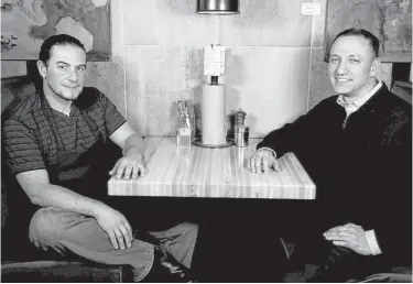  ?? James Nielsen photos / Houston Chronicle ?? Fielding’s Wood Grill culinary director and cofounder Edelberto Goncalves, left, and founder Cary Attar. Fielding’s is expanding this summer, opening a second location in the new Creekside Park Village Center at the end of July.