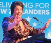  ??  ?? ABOVE: Paula and her daughter Ana at Parliament Buildings. The MP speaking at the National Party’s Annual Conference in 2017. With former Prime Minister John Key, serving breakfast to school children in West Auckland.