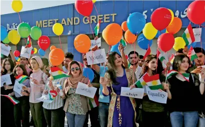  ?? Reuters ?? Kurdish people protest outside the Erbil Internatio­nal Airport against the flight ban on Friday. —