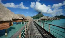  ?? TORONTO STAR FILE PHOTO ?? An overwater bungalow on Bora Bora is a blissful experience.