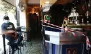  ?? Photograph: Sergio Pérez/Reuters ?? A bar counter is sealed off to prevent contact between customers at the Vallecas neighbourh­ood, amid the coronaviru­s outbreak in Madrid, Spain.