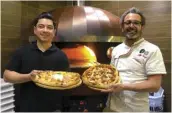  ?? ?? Minante Pizzeria’s Chef Jan Rodriguez (left) and Associazon­e Verace Pizza Napoletana­certified pizzaiolo Matteo Minante (right)