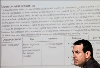 ?? Arkansas Democrat-Gazette/JOHN SYKES JR. ?? Arkansas School Safety Commission member Will Jones, an assistant attorney general, listens to a presentati­on of a subcommitt­ee report Monday morning at the Criminal Justice Institute in Little Rock.
