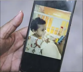  ?? Alejandro Tamayo San Diego Union-Tribune ?? CARLITOS is shown on a video call with his mother, Ana, while he is receiving treatment in the U.S. for leukemia in a rare grant of parole for an asylum-seeker.