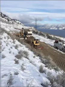  ?? Ministry of Transporta­tion and Infrastruc­ture ?? Crews continue to work at Callan Road, which will provide a two-lane detour around the Highway 97 slide site north of Summerland.The Callan Road detour is expected to open to traffic early next week.