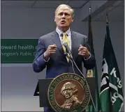  ?? THE ASSOCIATED PRESS ?? Washington Gov. Jay Inslee proposed a public health insurance option for people who are not covered by Medicaid or private employers and have trouble affording policies in the private market.