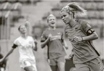  ?? Alex Goodlett / Getty Images ?? Dash forward Rachel Daly teamed with Shea Groom to score three goals against Utah in the Challenge Cup opener. Daly and Groom are tied for the team lead in goals scored (two apiece).