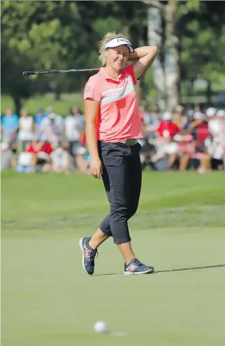  ?? CHARLES REX ARBOGAST/THE ASSOCIATED PRESS ?? Brooke Henderson’s recent hot play, including a win two weeks ago, has moved her up to eighth from the 12th spot in the Rolex Women’s World Golf Rankings released Monday.