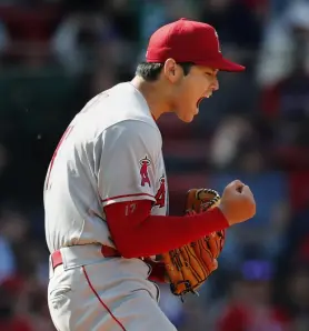  ?? Michael Dwyer, The Associated Press ?? The Angels’ Shohei Ohtani celebrates after striking out Boston’s Trevor Story during the seventh inning Thursday in Boston.