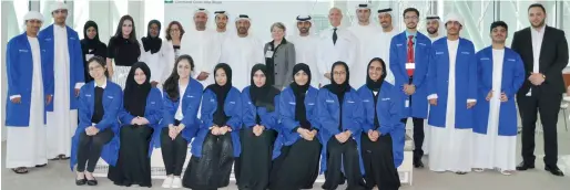  ?? Supplied photo ?? High school students, who received hands-on experience in the clinical field as volunteers at Cleveland Clinic Abu Dhabi, with the hospital officials. Among the 40 students who joined the Junior Caregiver Programme launched by the hospital 35 were UAE...