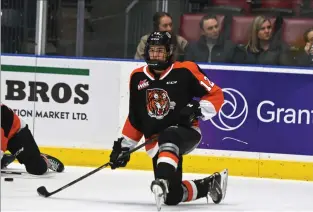  ?? NEWS PHOTO JAMES TUBB ?? Medicine Hat Tigers forward Liam Ruck stretches out during warmups ahead of a 4-3 overtime loss Saturday at Co-op Place to the Lethbridge Hurricanes.