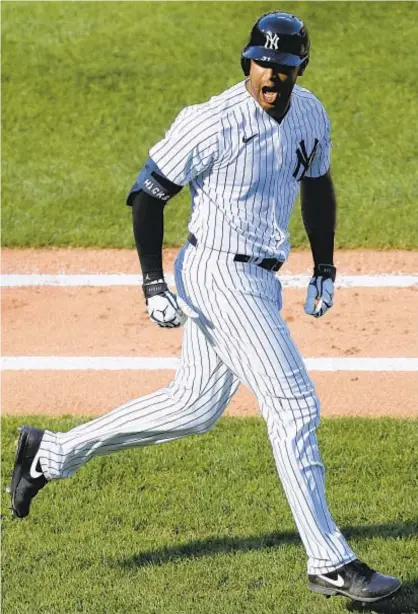  ?? GETTY ?? Yanks’ Aaron Hicks enjoys a good home run trot, but if pitchers won’t deliver, he’ll gladly take a free pass.