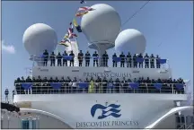  ?? PHOTO BY JO MURRAY ?? Officers, company officials and celebritie­s join on the bridge to celebrate the newest Princess cruise ship, Discovery.