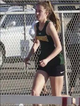  ??  ?? Holtville High’s Alexa Strahm competes in the 100-meter hurdle event during a meet at Imperial High earlier this year. KARINA LOPEZ FILE PHOTO