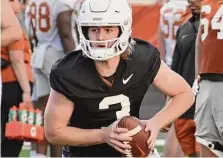  ?? Courtesy Texas Athletics ?? Ultimately, it’s a good bet transfer Quinn Ewers will win the battle to be UT’S starting QB in its season opener Sept. 3.
