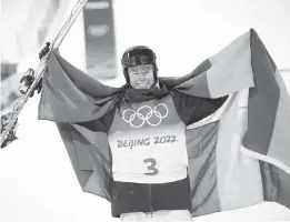  ?? FRANCISCO SECO AP ?? Sweden's Walter Wallberg celebrates after winning a gold medal in the men's moguls at Genting Snow Park at the 2022 Winter Olympics in Zhangjiako­u, China.