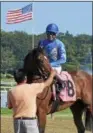  ?? DAVID M. JOHNSON — DJOHNSON@DIGITALFIR­STMEDIA.COM ?? Uncle Sigh, with Jose Ortiz up, won Race 7Monday at Saratoga Race Course. It was the fourth of five winning rides for Ortiz on the day.