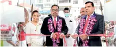  ?? ?? The Chief Guest at the occasion, Harsha Kurukulasu­riya – AGM Operations and Administra­tion of Pan Asia Bank is seen declaring the branch open. Also in the photograph are Inoka Abeykoon-Manager Pilimathal­awa Branch and Nimal Ratnayake AGM – Branch Credit of Pan Asia Bank.