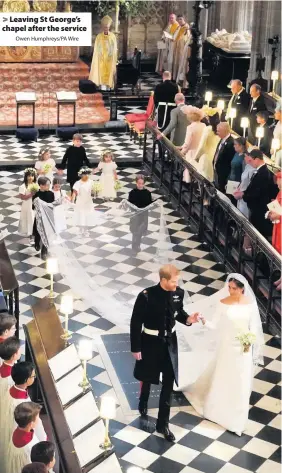  ?? Owen Humphreys/PA Wire ?? > Leaving St George’s chapel after the service