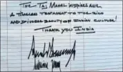  ?? PTI/ANI ?? US President Donald Trump leaves messages in the visitors' books
■ at the Sabarmati Ashram (above) and the Taj Mahal.