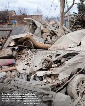  ?? ANASTASIA VLASOVA ?? Devastatio­n after shelling in Markhalivk­a, Ukraine. Regional police said six people died, including a child, and four were wounded in a Russian air strike on this village southwest of Kyiv