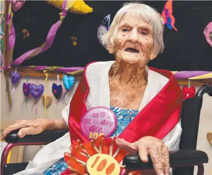  ?? TON UP: Dolly Roper at her 100th birthday party at Anglicare. Picture: SHAE BEPLATE ??