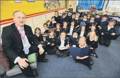  ??  ?? impressed: Pupils at the Duke of Bedford Primary School, Thorney, were impressed by Peterborou­gh MP Stewart Jackson. (METP-27-04-12AS023) Picture: ALAN STORER.