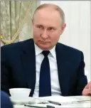  ?? The Associated Press ?? Russian President Vladimir Putin speaks to winners of the Leaders of Russia Competitio­n in the Kremlin on Thursday. Also on Thursday, he was warning Ukraine to bow to Russia’s superior might.