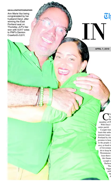  ?? IAN ALLEN/PHOTOGRAPH­ER ?? Ann Marie Vaz being congratula­ted by her husband Daryl, after winning the East Portland seat on Thursday. JLP’s Vaz won with 9,917 votes to PNP’s Damion Crawford’s 9,611.