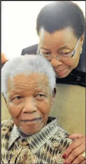  ??  ?? Nelson Mandela relaxes with Graça Machel at home after casting his special vote for the 2011 local government elections.
