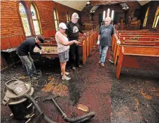  ?? JOHN RENNISON THE HAMILTON SPECTATOR ?? Don Lynch, Beverley Martin, Ron Monture and John Anderson inside the damaged St. John's Church.