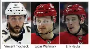  ?? THE ASSOCIATED PRESS ?? From left are file photos showing Vincent Trocheck, Lucas Wallmark and Erik Haula. The Carolina Panthers traded Vincent Trocheck to the Carolina Hurricanes for Erik Haula, Lucas Wallmark and prospects Chase Priskie and Eetu Luostarine­n, Monday.