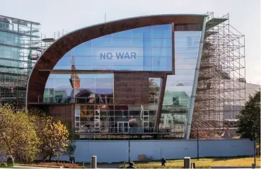  ?? ?? Evgeny Antufiev’s ‘No War’ message on the facade of Kiasma, Helsinki, 2022. Photo: Petri Virtanen. Courtesy Finnish National Gallery, Helsinki