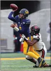  ?? KARL MONDON — STAFF PHOTOGRAPH­ER ?? Oregon State’s Matthew Tago, right, pressures Cal quarterbac­k Devon Modster during Saturday’s game at Memorial Stadium.