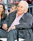  ??  ?? Hollywood acting legend Kirk Douglas died on Wednesday aged 103. He is pictured above in 2018 at his son Michael’s Hollywood Walk Of Fame ceremony