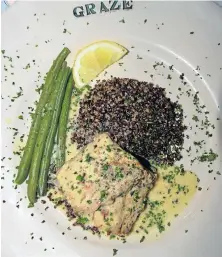  ?? Pictures: JON HOUZET ?? ENHANCING FLAVOURS: Second course at the latest Graze by the River food and wine pairing was baked fresh kob with thermidor sauce, quinoa and steamed French beans. It was paired with the Mellasat chardonnay 2013