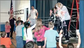  ??  ?? To motivate students on their team to reach class goals for the APEX event, Kristie Chastain and Paula Rich agreed to a Silly String attack. Their students had a blast covering their teachers in silly string.