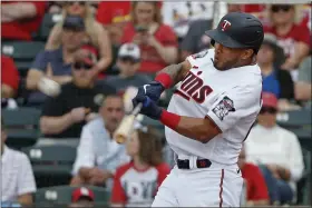  ?? ELISE AMENDOLA — THE ASSOCIATED PRESS ?? The Twins’ Eddie Rosario hits during a spring training game against the Cardinals on March 9, 2020, in Fort Myers, Fla.