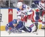  ?? Claus Andersen / Getty Images ?? Ryan Strome (16) of the New York Rangers tries to break past Morgan Rielly (44) of the Toronto Maple Leafs at Scotiabank Arena on Thursday in Toronto. The Maple Leafs won 2-1.