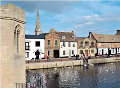  ??  ?? The river Great Ouse flows beneath Chapel Bridge in St Ives, Huntingdon­shire