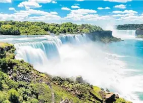  ?? JAM NORASETT/SHUTTERSTO­CK ?? The mighty Niagara Falls straddle the American-Canadian border, and it’s one of the continent’s most-visited and beloved tourist attraction­s, with more than 8 million annual visitors. Now you can visit the falls virtually on EarthCam.com.