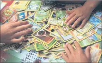  ?? STAFF ARCHIVES ?? Trading card sales rose to a record 142% on eBay in 2020. Pokéman cards were sold at a rate of five a minute, faster than sports cards.