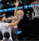  ?? FE ?? Karl Towns volvió a ser la pieza clave en el triunfo de Minnesota Timberwolv­s.