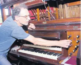  ?? ?? Friedemann Buschbeck examines the organ at the St James Parish Church in Montego Bay on Tuesday, November 15.